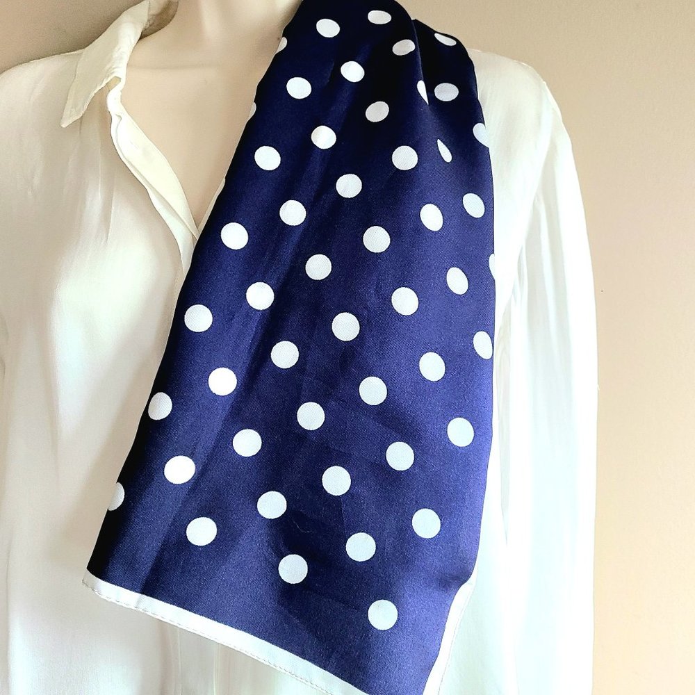 Monique Martin blue and white polka dot scarf.